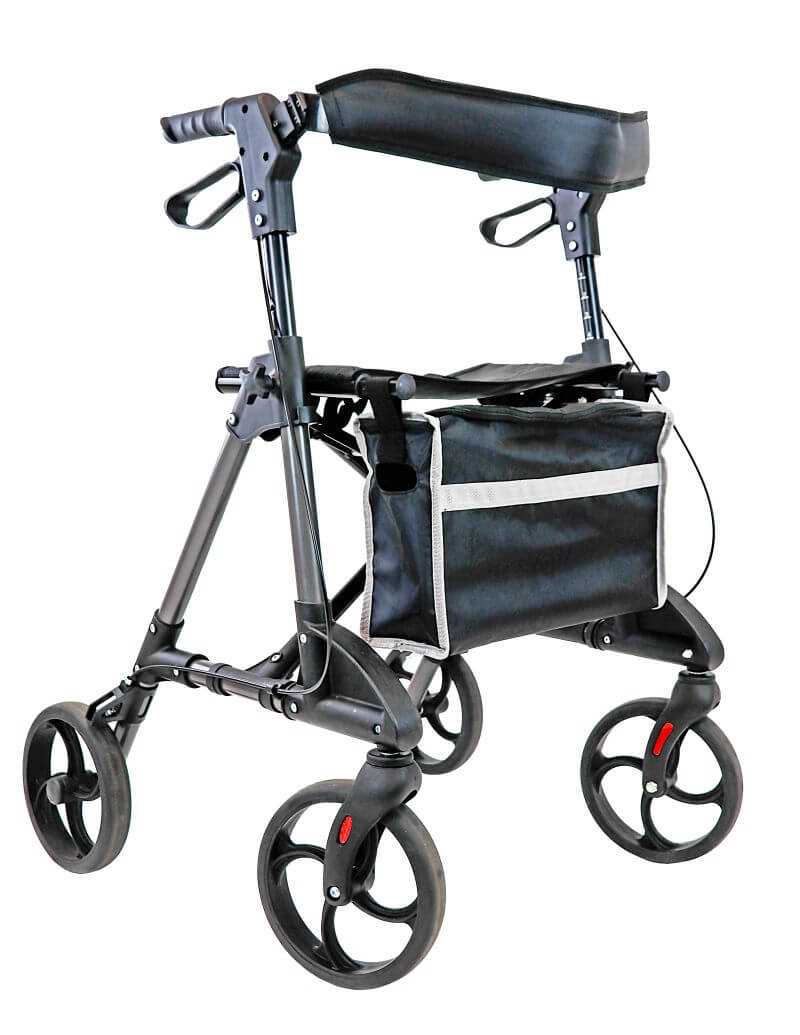 Modell Omni von Trendmobil, Seiten-/Frontansicht eines Rollators in der Farbe anthrazit mit Rückengurt und geschlossener schwarzer Tasche