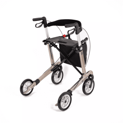 Modell Carlbon von SMINA, Carbon-Rollator, Farbe Champagner, mit Tasche, Rückengurt und Softbereifung, Seitenansicht, nach hinten, rechts